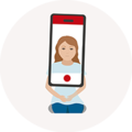Une personne enregistre une vidéo avec un smartphone